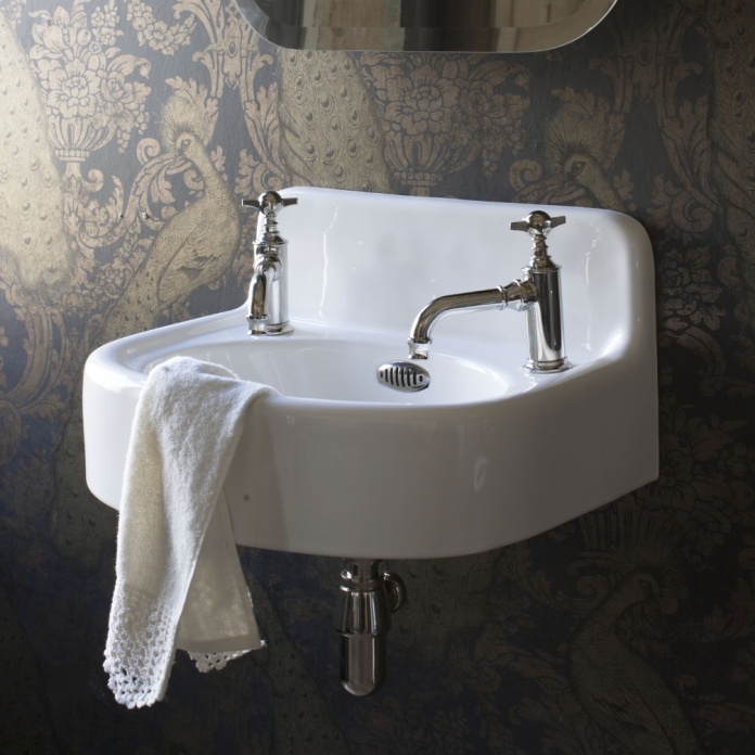 Close up product lifestyle image of the Burlington Arcade 500mm Cloakroom Basin with two tap holes